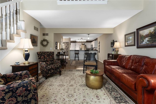 5817 Park Cir, Shawnee, KS 66216 - living area with wood finished floors and baseboards