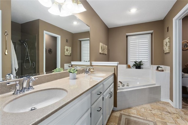 5817 Park Cir, Shawnee, KS 66216 - bathroom with a bath, double vanity, a stall shower, stone tile floors, and a chandelier