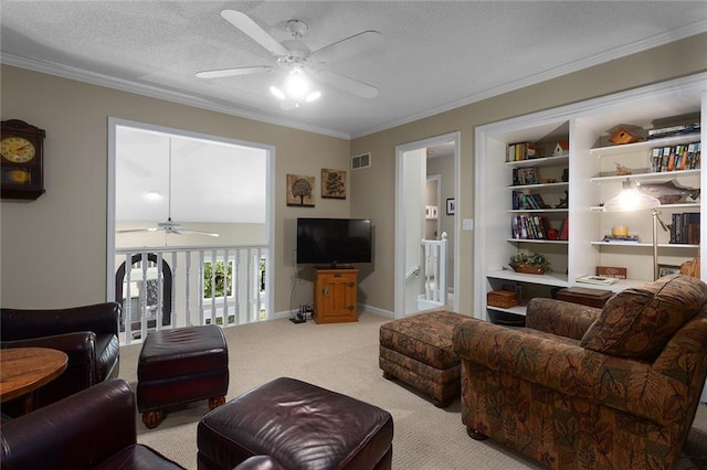 5817 Park Cir, Shawnee, KS 66216 - living room featuring ceiling fan, carpet floors, ornamental molding, and built in features