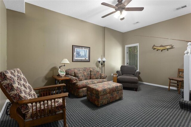 5817 Park Cir, Shawnee, KS 66216 - carpeted living area featuring a ceiling fan and baseboards