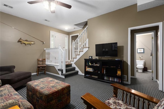 5817 Park Cir, Shawnee, KS 66216 - carpeted living room with stairs and ceiling fan