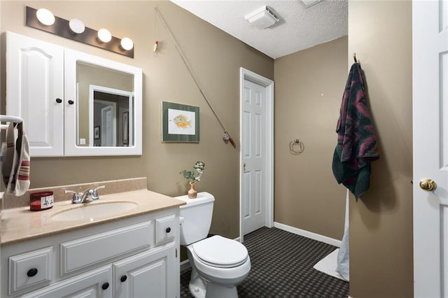 5817 Park Cir, Shawnee, KS 66216 - bathroom with vanity and a textured ceiling