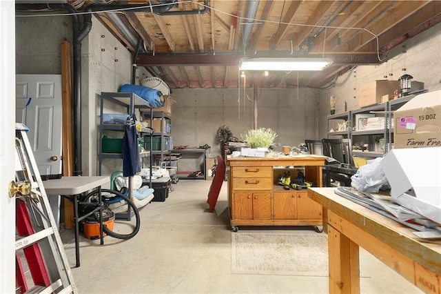 5817 Park Cir, Shawnee, KS 66216 - unfinished below grade area with a workshop area