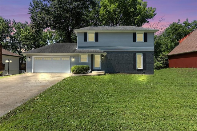 7421 NW 76th Ter, Kansas City, MO 64152 - traditional-style house featuring concrete driveway, a garage, a front yard, and brick siding