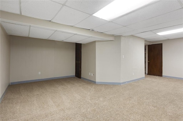 7421 NW 76th Ter, Kansas City, MO 64152 - spare room with a drop ceiling and carpet