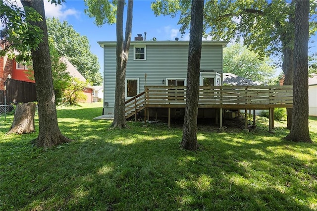 7421 NW 76th Ter, Kansas City, MO 64152 - rear view of house with a wooden deck