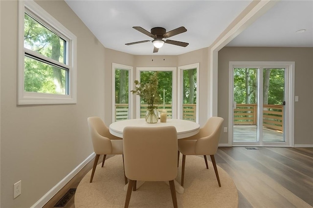 7421 NW 76th Ter, Kansas City, MO 64152 - dining space with wood finished floors and ceiling fan
