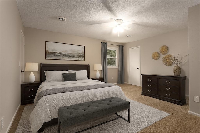 7421 NW 76th Ter, Kansas City, MO 64152 - bedroom with light carpet, ceiling fan, and a textured ceiling