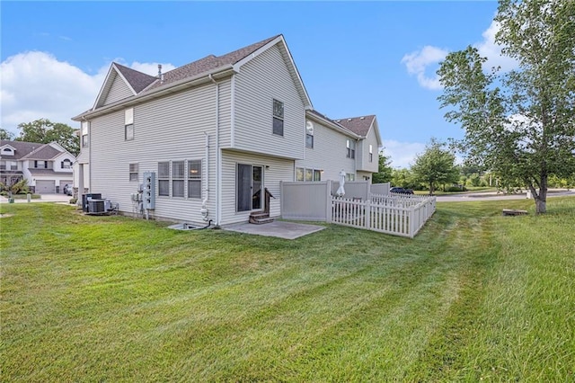 9583 N Main St, Kansas City, MO 64155 - back of property featuring entry steps, a patio area, and a shingled roof