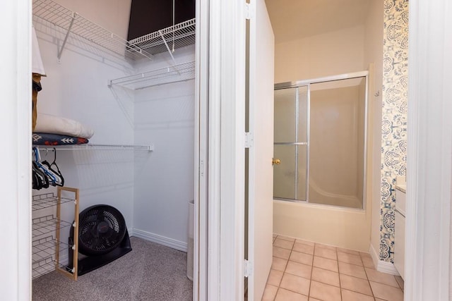 308 W 8th St Unit 409, Kansas City, MO 64105 - walk in closet featuring tile patterned flooring