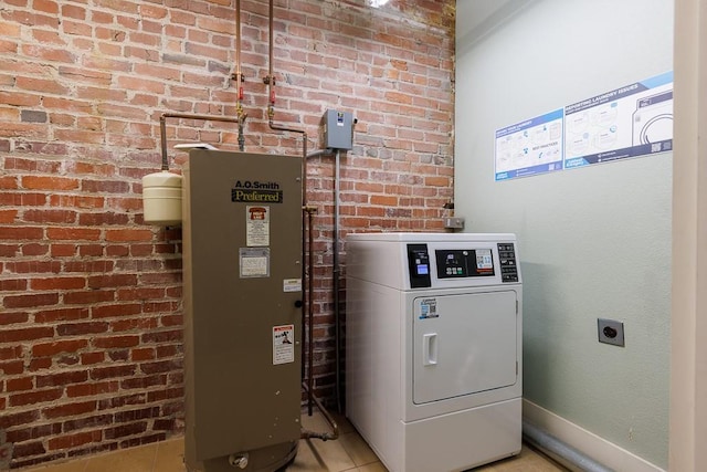308 W 8th St Unit 409, Kansas City, MO 64105 - utility room featuring washer / clothes dryer