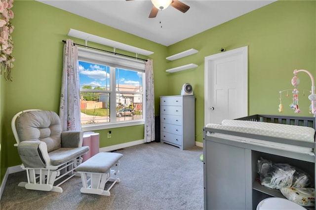 307 S Wilson St, Archie, MO 64725 - bedroom featuring carpet flooring and a ceiling fan