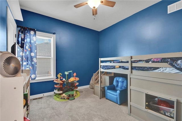 307 S Wilson St, Archie, MO 64725 - bedroom with carpet floors and a ceiling fan