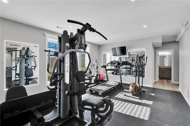 307 S Wilson St, Archie, MO 64725 - workout area featuring healthy amount of natural light and recessed lighting