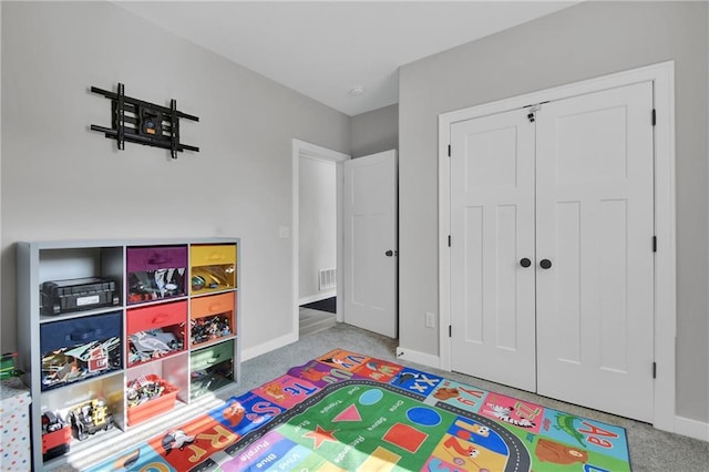 307 S Wilson St, Archie, MO 64725 - rec room with carpet flooring and baseboards