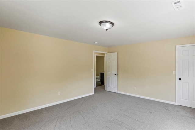 526 S Maple St, Ottawa, KS 66067 - carpeted spare room featuring baseboards