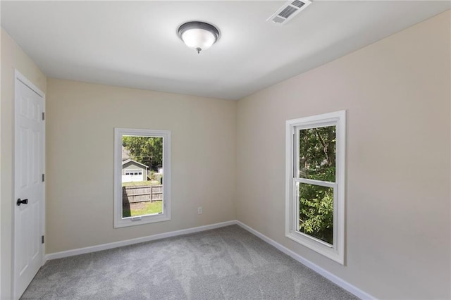 526 S Maple St, Ottawa, KS 66067 - carpeted empty room featuring baseboards