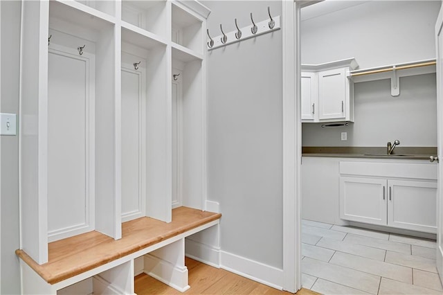 2210 W 73rd St, Prairie Village, KS 66208 - mudroom with a sink and light wood-type flooring