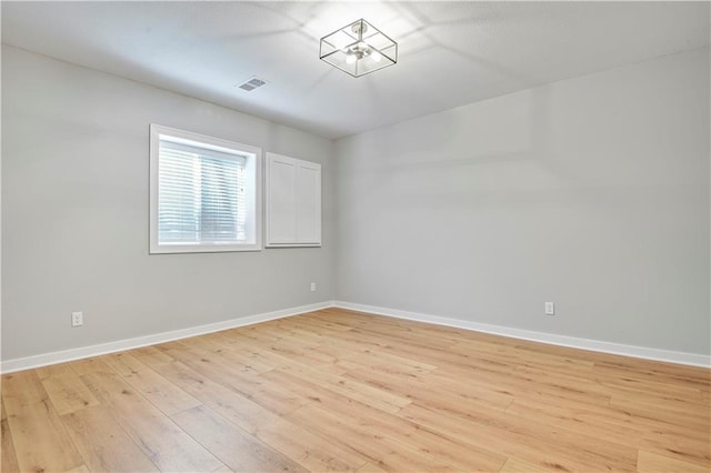 2210 W 73rd St, Prairie Village, KS 66208 - unfurnished room featuring light wood-style flooring and baseboards