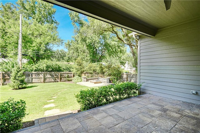 2210 W 73rd St, Prairie Village, KS 66208 - fenced backyard with a patio area
