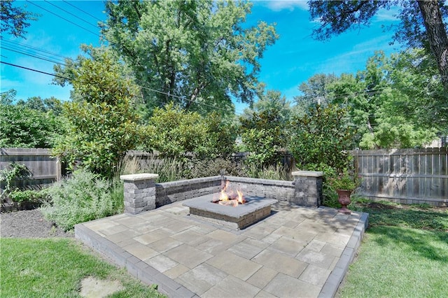 2210 W 73rd St, Prairie Village, KS 66208 - fenced backyard featuring a fire pit and a patio
