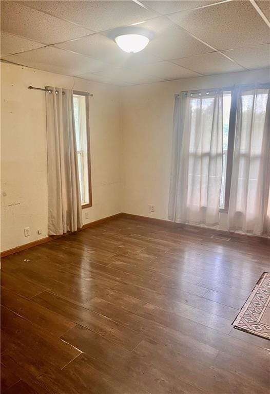 5325 Sawyer St, Saint Joseph, MO 64504 - spare room with hardwood / wood-style flooring and a paneled ceiling