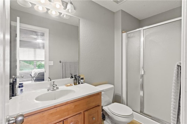 820 Peach Tree Ln, Blue Springs, MO 64064 - ensuite bathroom with a shower stall, vanity, and a textured wall