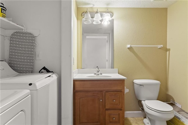 820 Peach Tree Ln, Blue Springs, MO 64064 - bathroom featuring separate washer and dryer and vanity