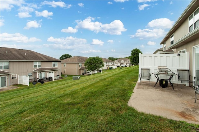820 Peach Tree Ln, Blue Springs, MO 64064 - view of yard featuring a residential view and a patio area