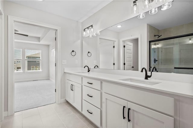 16716 S Twilight Ln, Olathe, KS 66062 - full bathroom featuring double vanity, a shower stall, and tile patterned floors