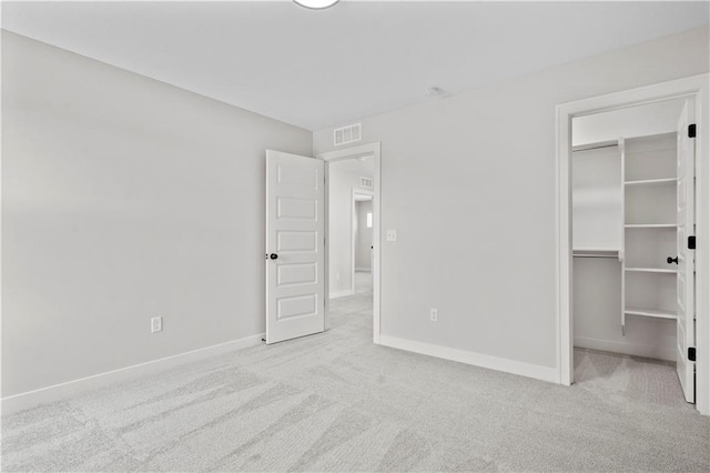 16716 S Twilight Ln, Olathe, KS 66062 - unfurnished bedroom with carpet flooring, a walk in closet, and a closet