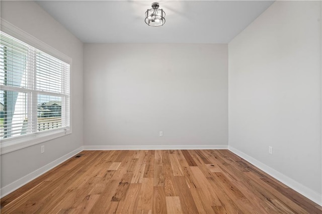 16716 S Twilight Ln, Olathe, KS 66062 - unfurnished room featuring light wood finished floors and baseboards