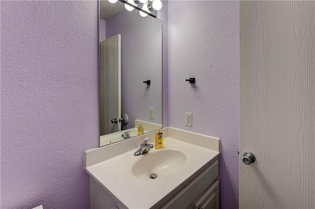 3524 NE Austin Dr, Lees Summit, MO 64064 - bathroom featuring a textured wall and vanity