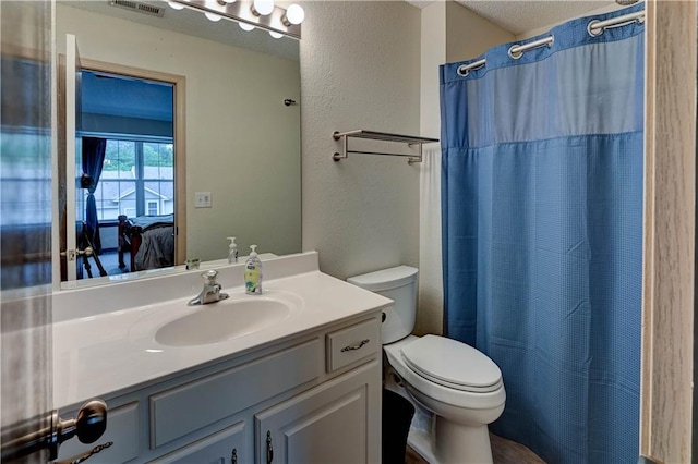 3524 NE Austin Dr, Lees Summit, MO 64064 - bathroom with vanity, a shower with shower curtain, and a textured wall