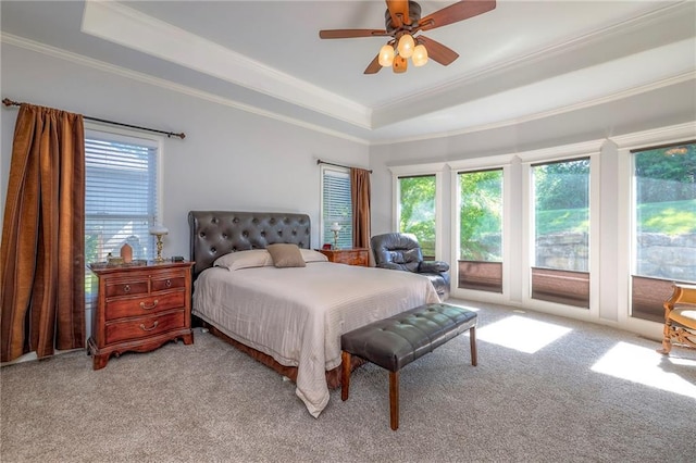 3013 S Granite Ave, Blue Springs, MO 64015 - bedroom featuring ornamental molding, light carpet, a raised ceiling, access to outside, and ceiling fan