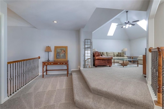 3013 S Granite Ave, Blue Springs, MO 64015 - carpeted bedroom featuring a skylight, vaulted ceiling, and a ceiling fan