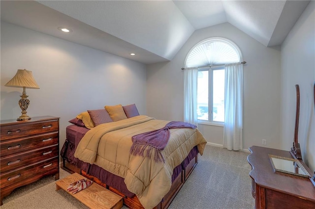 3013 S Granite Ave, Blue Springs, MO 64015 - bedroom featuring light colored carpet, vaulted ceiling, multiple windows, and recessed lighting