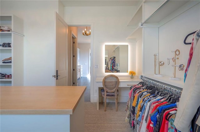 7736 N Donnelly Ave, Kansas City, MO 64158 - spacious closet with a chandelier