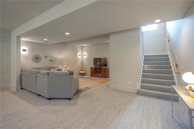 7736 N Donnelly Ave, Kansas City, MO 64158 - living area with carpet, stairway, and recessed lighting
