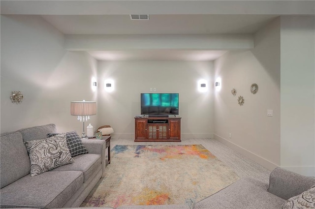 7736 N Donnelly Ave, Kansas City, MO 64158 - living area featuring light carpet and beam ceiling