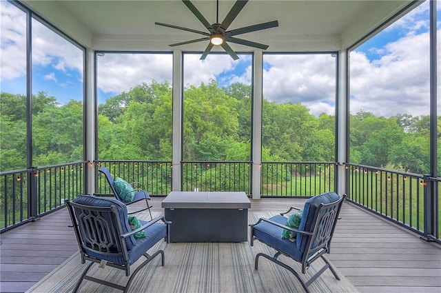 7736 N Donnelly Ave, Kansas City, MO 64158 - sunroom / solarium with a ceiling fan, outdoor lounge area, and plenty of natural light