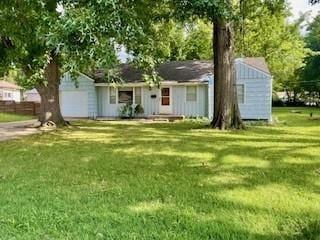 3716 W 48th St, Roeland Park, KS 66205 - single story home with a front lawn, an attached garage, and driveway