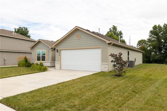 7908 SE 6th Ter, Blue Springs, MO 64014 - view of front of home with a front lawn, concrete driveway, a garage, and stone siding