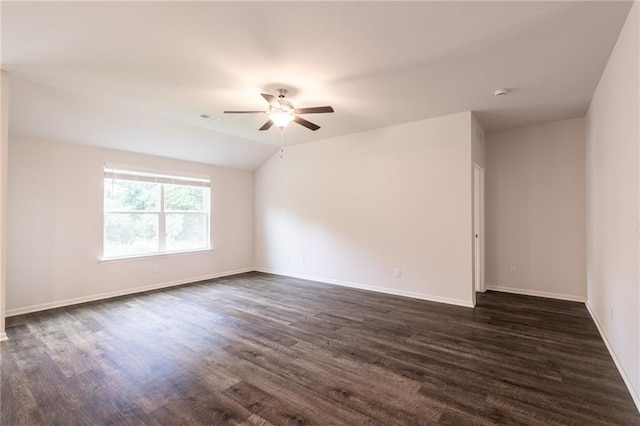 7908 SE 6th Ter, Blue Springs, MO 64014 - empty room featuring ceiling fan, dark wood finished floors, vaulted ceiling, and a smoke detector