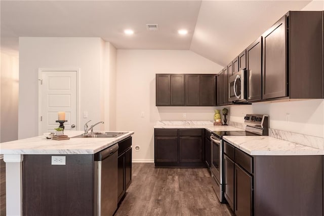 7908 SE 6th Ter, Blue Springs, MO 64014 - kitchen featuring stainless steel appliances, dark wood-style flooring, vaulted ceiling, light countertops, and dark brown cabinetry