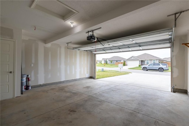 7908 SE 6th Ter, Blue Springs, MO 64014 - garage with a garage door opener and a residential view