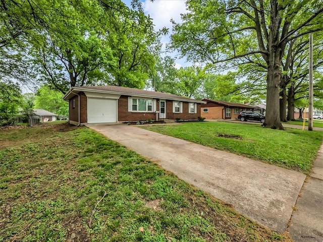 3717 S Hocker St, Independence, MO 64055 - ranch-style home featuring brick siding, a garage, concrete driveway, and a front yard