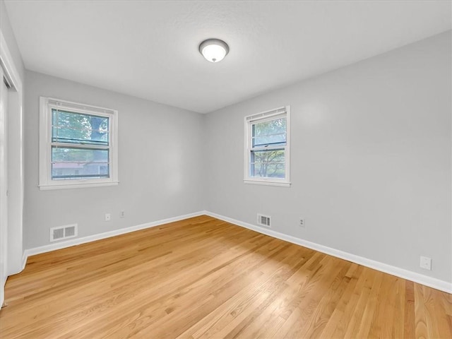 3717 S Hocker St, Independence, MO 64055 - empty room featuring baseboards and light wood finished floors