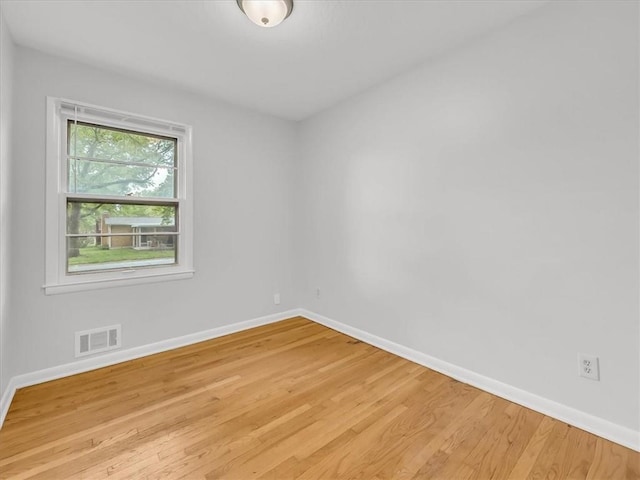 3717 S Hocker St, Independence, MO 64055 - unfurnished room with light wood-style floors and baseboards