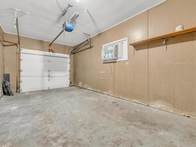 3717 S Hocker St, Independence, MO 64055 - garage featuring a garage door opener
